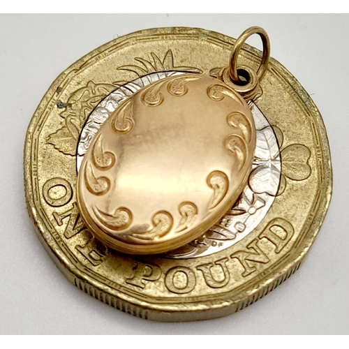 687 - A 9K Yellow Gold Sliding Locket. 1g total weight. SH1609I