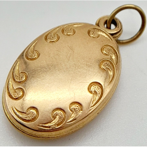 687 - A 9K Yellow Gold Sliding Locket. 1g total weight. SH1609I