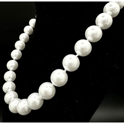 779 - A Bright White South Sea Pearl Shell Large Bead Necklace. 14mm beads. 42cm necklace length.