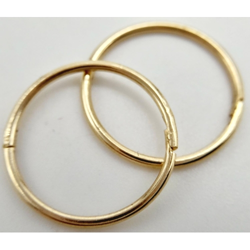 783 - A 9K YELLOW GOLD MINI HOOP SLEEPER EARRINGS. 0.8G IN WEIGHT. Ref: SC 5006.