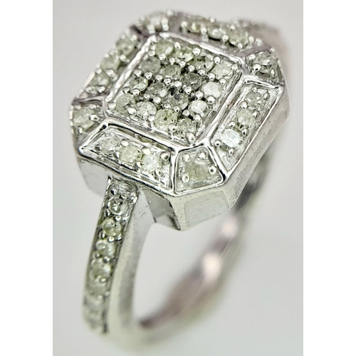 916 - A STERLING SILVER DIAMOND SET CLSUTER RING. 3.28G IN WEIGHT. SIZE N AND 1/2. Ref: 8785