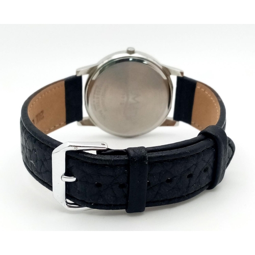 932 - A Men’s Blue Dial Quartz Watch by Limit. 40mm Including Crown. Full Working Order. On a Black Camel ... 