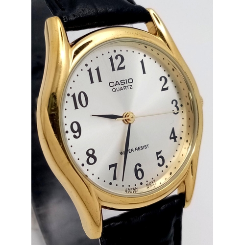 978 - A Vintage Men’s Collectible Casio Gold Tone Quartz Watch Model 1330 MTP 1154P. 35mm Including Crown.... 