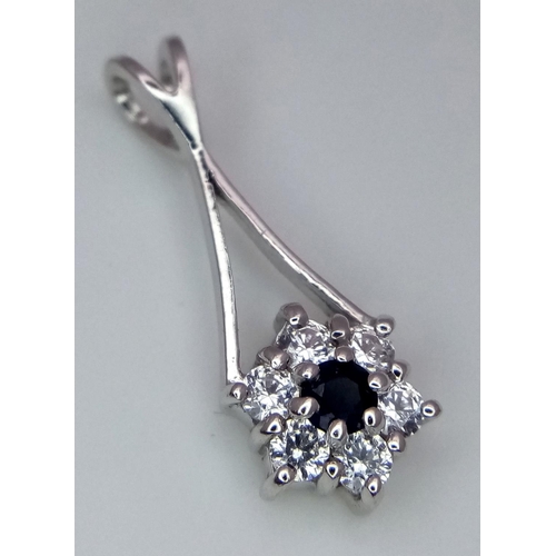 987 - A 18K WHITE GOLD STONE SET DROP PENDANT. 1.45G IN WEIGHT. APPROX 2CM IN LENGTH. Ref: SC 5025.