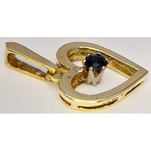 1099 - A 18K YELLOW GOLD ( TESTED ) SAPPHIRE SET HEART PENDANT. 1.87G IN WEIGHT. Ref: SC 5079.