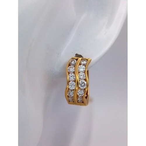 603 - A Pair of 18K Yellow Gold, 2.4ctw Diamond, Oval Earrings. Pierced decoration with each earring havin... 