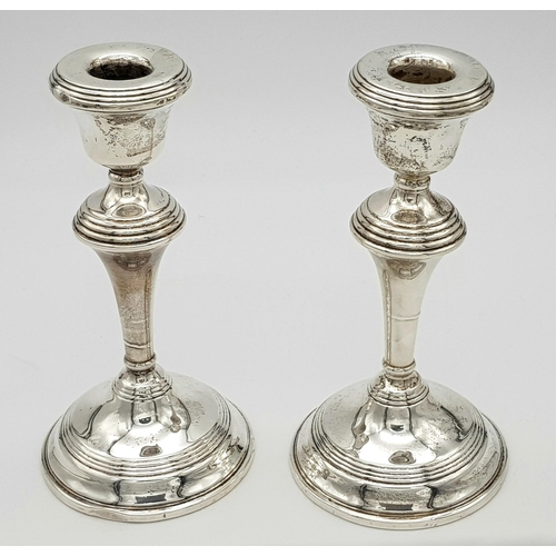 617 - A Pair of Vintage Mid-Size Candlestick Holders. 18cm tall. Birmingham hallmarks for 1961. Weighted a... 