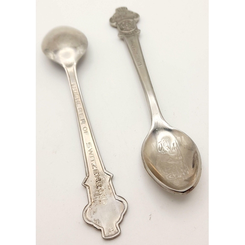 843 - A pair of small metal teaspoons made for Bucherer of Lucerne Switzerland. 11cm in length. See photos... 