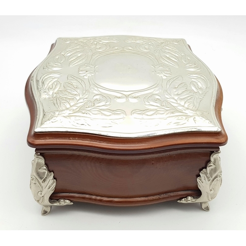 604 - A Silver Lidded Jewellery Box. 18 x 16cm.