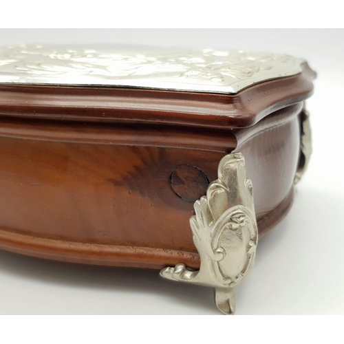 604 - A Silver Lidded Jewellery Box. 18 x 16cm.