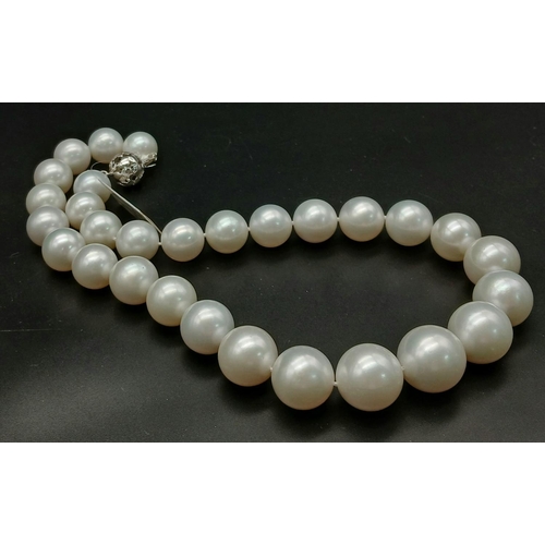 505 - A top quality pearl necklace by ANGEPERIE, graduating size 12.4 to 16.9  mm, perfectly spherical, wh... 