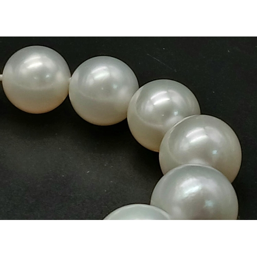 505 - A top quality pearl necklace by ANGEPERIE, graduating size 12.4 to 16.9  mm, perfectly spherical, wh... 