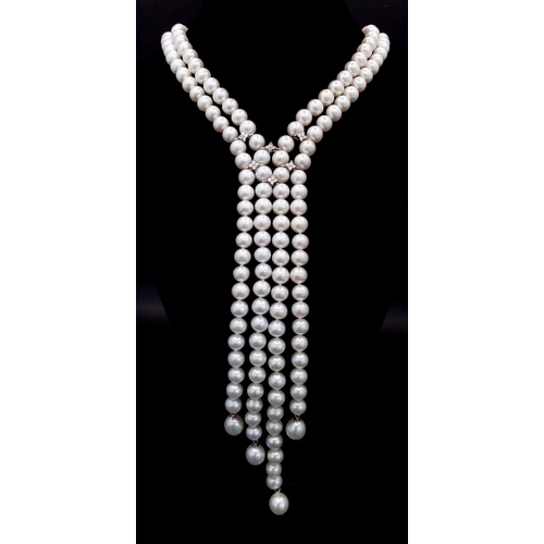 520 - A fabulous two string top quality pearl necklace with cubic zirconia connectors. 8 mm white spherica... 