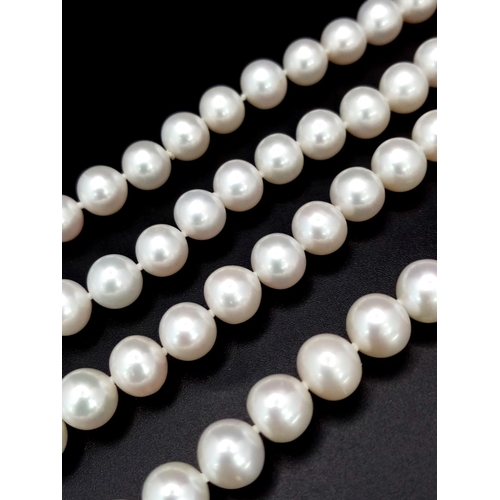 520 - A fabulous two string top quality pearl necklace with cubic zirconia connectors. 8 mm white spherica... 