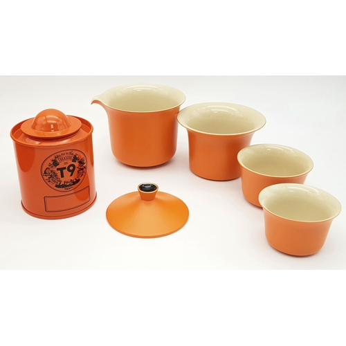 611 - A Portable Kung Fu T9 Ceramic Tea Set - Includes tea caddy, tea pot, large cup and two drinking cups... 