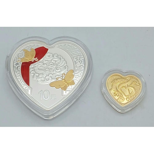 619 - A Fine Gold (.999) and Silver (.999) Commemorative Heart-Shaped Coin. Celebrating 2022 auspicious cu... 