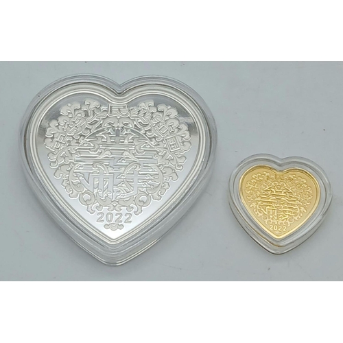 619 - A Fine Gold (.999) and Silver (.999) Commemorative Heart-Shaped Coin. Celebrating 2022 auspicious cu... 