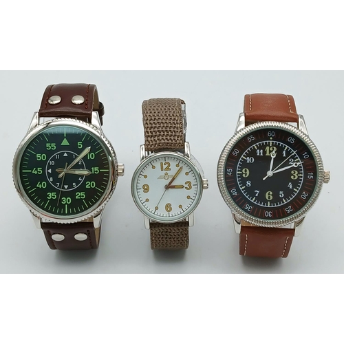 662 - Three Military Pilot Design Watches Comprising: 1) A German Lace Design Pilots watch - 48 mm Case. 2... 