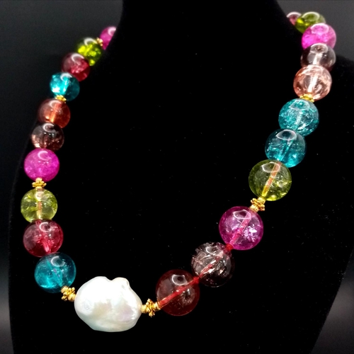 688 - A Kaleidoscopic Multi-Coloured Tourmaline Large Bead Necklace with Baroque Pearl Interrupter. 14mm b... 