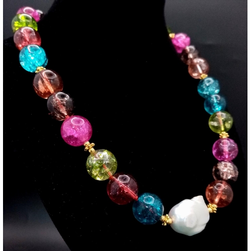 688 - A Kaleidoscopic Multi-Coloured Tourmaline Large Bead Necklace with Baroque Pearl Interrupter. 14mm b... 