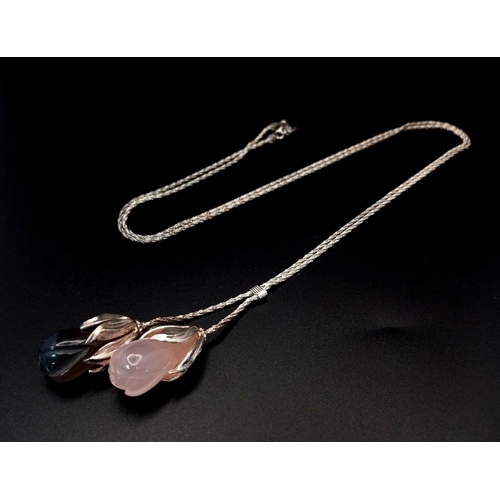 836 - A sterling silver and rose quartz necklace and bracelet set in presentation box. The chain necklace ... 