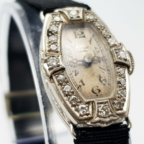 654 - A 1920s Art Deco Mappin and Webb Platinum and Diamond Cocktail Ladies Watch. Original textile strap.... 