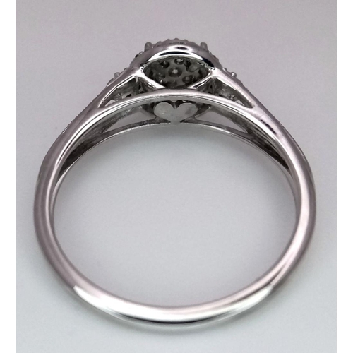 1001 - A 9K WHITE GOLD DIAMOND RING. 0.15CT. 1.75G IN WEIGHT. SIZE K AND 1/2. Ref: 8690.