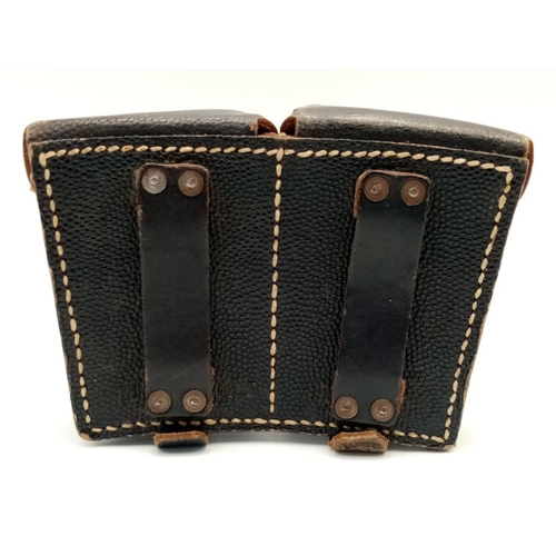 1028 - A WW2 German Double Magazine Leather Cartridge Belt in Very Good Condition. From the Deceased Estate... 