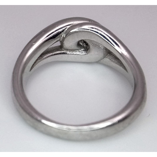 1036 - STERLING SILVER DIAMOND SET KNOT RING. 6.2G IN WEIGHT. SIZE N. Ref: 8781.