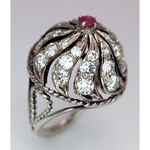 1057 - A STERLING SILVER STONE SET SWIRL RING. 4.6G IN WEIGHT. SIZE I AND 1/2. Ref: 8771.