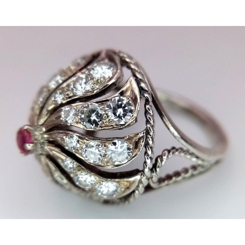 1057 - A STERLING SILVER STONE SET SWIRL RING. 4.6G IN WEIGHT. SIZE I AND 1/2. Ref: 8771.