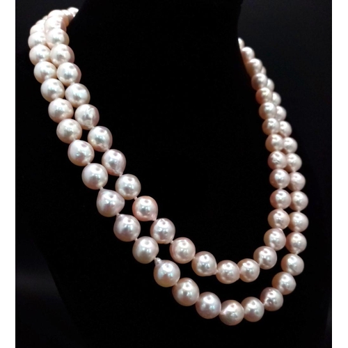 512 - The name that says everything! A new/unused AKOYA pearl necklace with a single strand of perfectly s... 