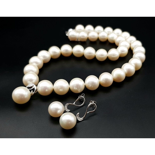 842 - A MIYU quality pearl necklace and assorted earrings in original wooden presentation box with tags. T... 