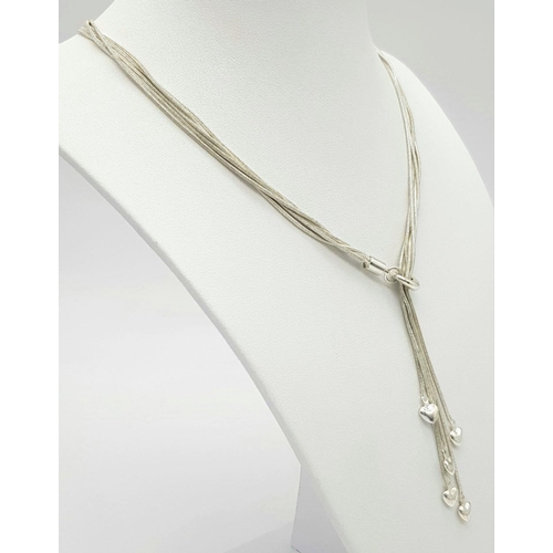 898 - A modern sterling silver multi  strand necklace with heart shaped pendants. The length of the neckla... 