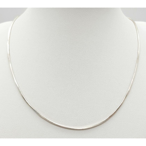 899 - Three sterling silver chain necklaces of different styles. Length: 38-40 cm, total weight: 20.3 g.