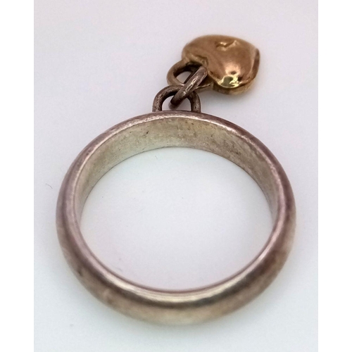 926 - A Vintage Silver Ring With a Hanging Gold (tests as 9k) Charm. Size H.