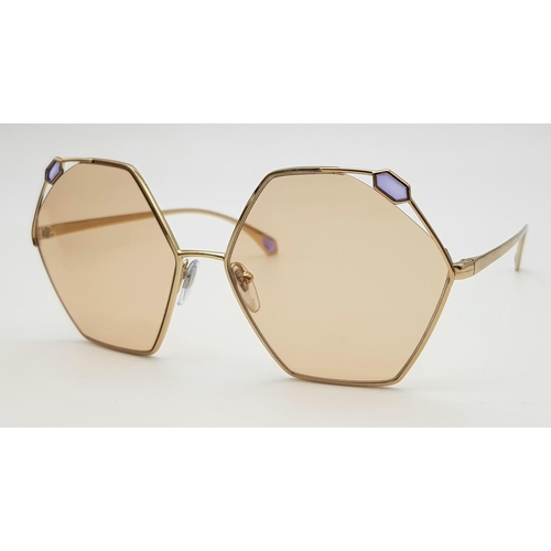 1034 - A Pair of Designer Ladies Bulgari Sunglasses. Hexagonal shape. Good condition. Box and case.