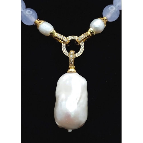 1024 - A Lavender Jade Bead Necklace with Hanging Baroque Pearl Pendant. 10mm jade beads. Pendant length - ... 