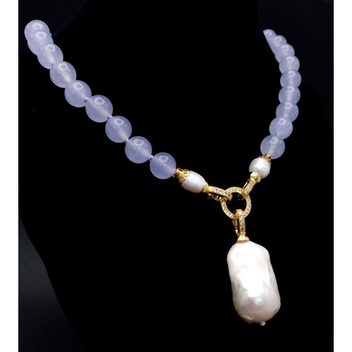 1024 - A Lavender Jade Bead Necklace with Hanging Baroque Pearl Pendant. 10mm jade beads. Pendant length - ... 