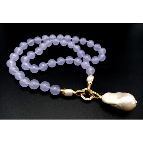 1024 - A Lavender Jade Bead Necklace with Hanging Baroque Pearl Pendant. 10mm jade beads. Pendant length - ... 