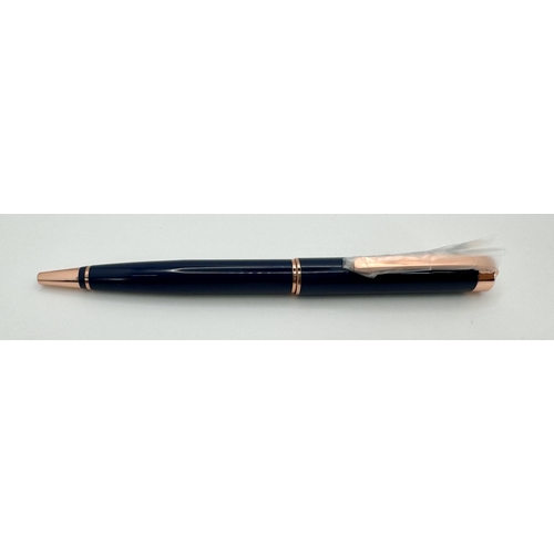 1181 - A HUGO BOSS blue ball point pen in presentation box in new/unused condition. Length: 14 cm