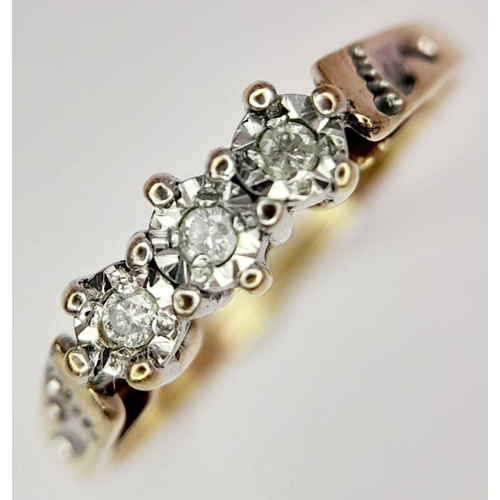 1183 - A 9K YELLOW GOLD VINTAGE DIAMOND 3 STONE RING WITH BABY PRINTS ON SIDE WITH ORIGINAL PUSH RING.  1.8... 