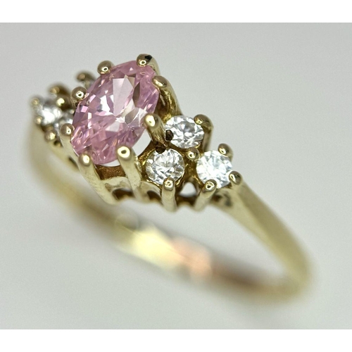 600 - A 9K YELLOW GOLD STONE SET RING - 2.1G. SIZE N. REF: CHIN 5001