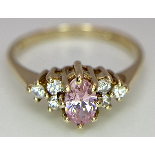 600 - A 9K YELLOW GOLD STONE SET RING - 2.1G. SIZE N. REF: CHIN 5001