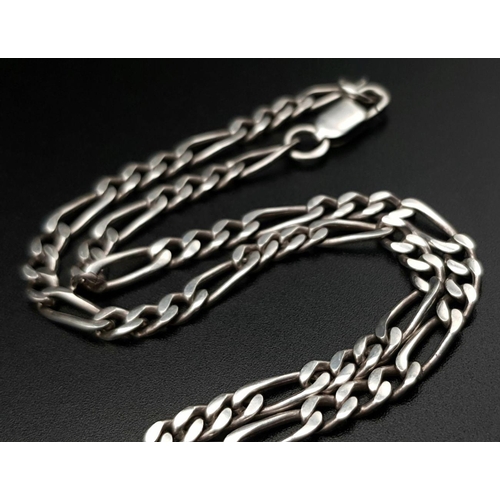 646 - A very elegant Solid Silver 925 figaro chain necklace, 21 grams, 63cm. Excellent condition.