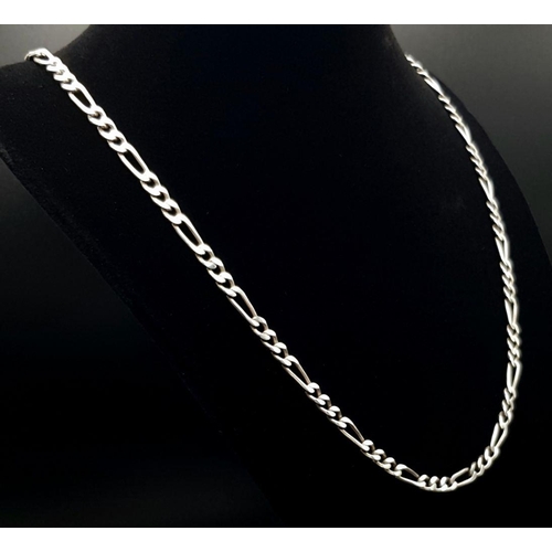 646 - A very elegant Solid Silver 925 figaro chain necklace, 21 grams, 63cm. Excellent condition.