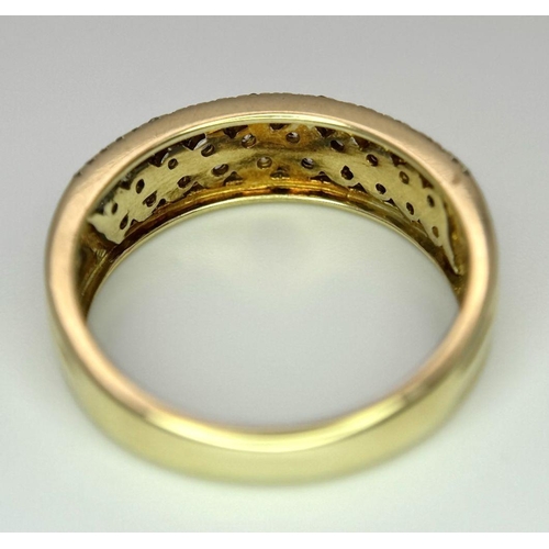 677 - A 9K YELLOW GOLD DIAMOND BAND RING. 0.30CT. 3.2G IN WEIGHT. SIZE O. Ref: SC 5004.