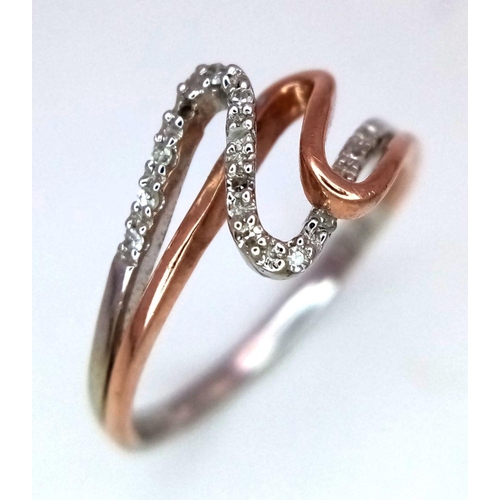 804 - A 9K WHITE GOLD & ROSE GOLD DIAMOND SET SWIRL RING 1.75G SIZE M. Ref: SC 5008.