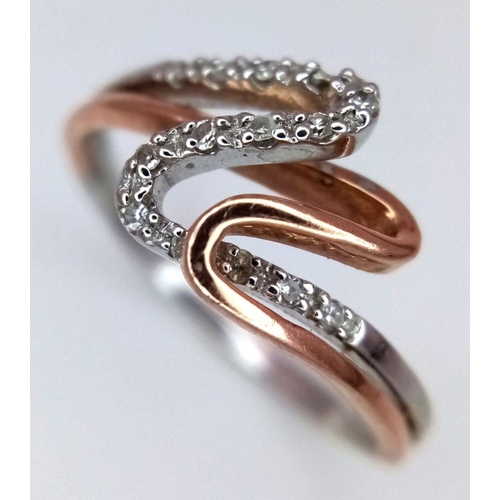 804 - A 9K WHITE GOLD & ROSE GOLD DIAMOND SET SWIRL RING 1.75G SIZE M. Ref: SC 5008.