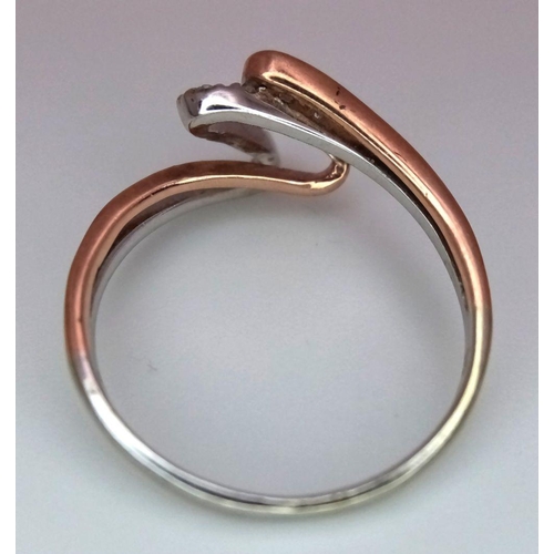 804 - A 9K WHITE GOLD & ROSE GOLD DIAMOND SET SWIRL RING 1.75G SIZE M. Ref: SC 5008.